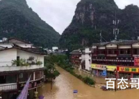 航拍广西阳朔洪水退去 商家已经在清扫被水灾洗礼后的家产