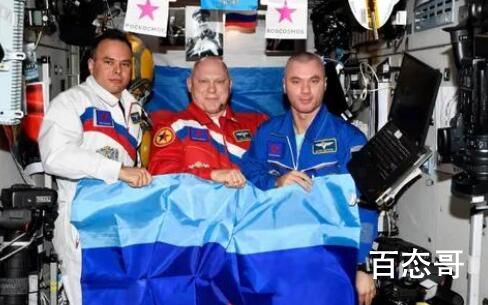 空间站国旗与地球同框 时间终将从渺小中筛选出伟大