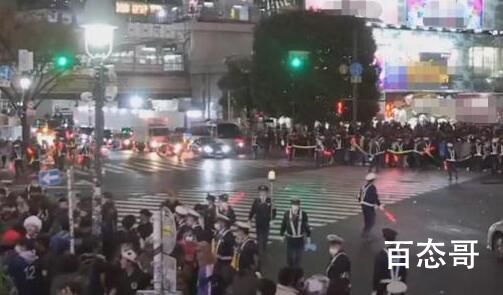 日本上万球迷街头狂欢 防暴警察出动 日本明天还不放假吗